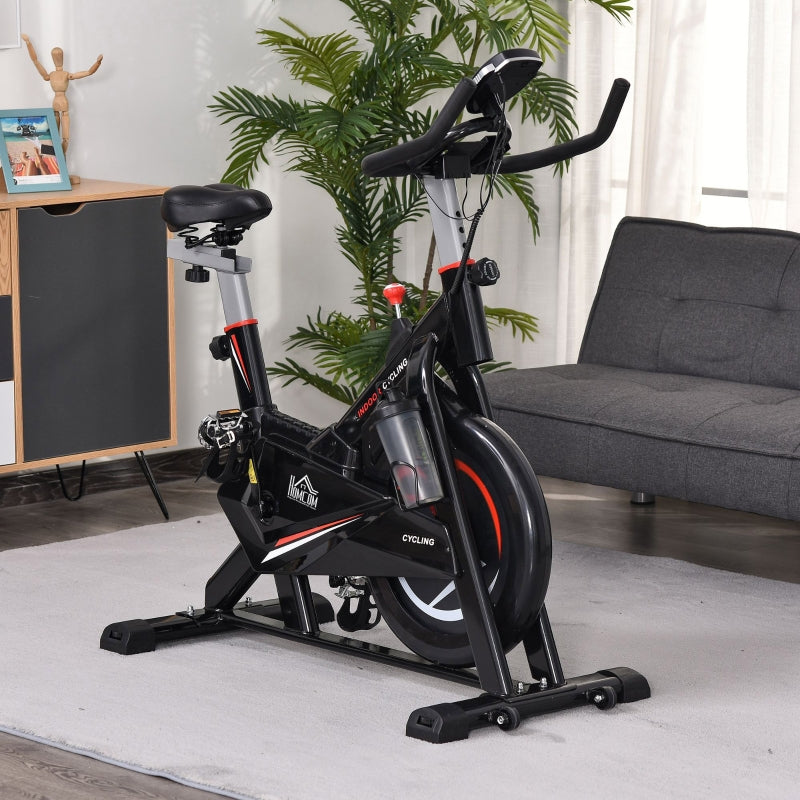 Black Stationary Exercise Bike with Adjustable Resistance and LCD Monitor